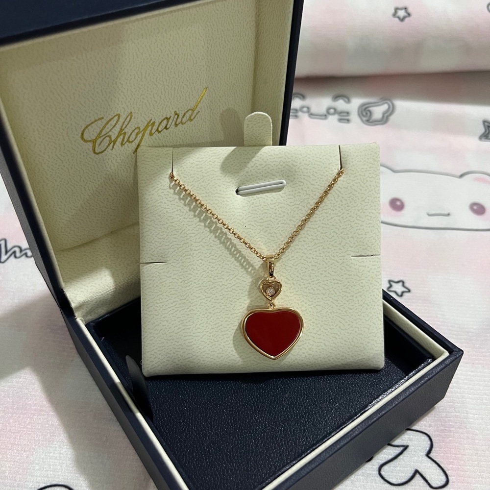 Chopard Gold Necklace with Red Heart and Small Crystal Accent